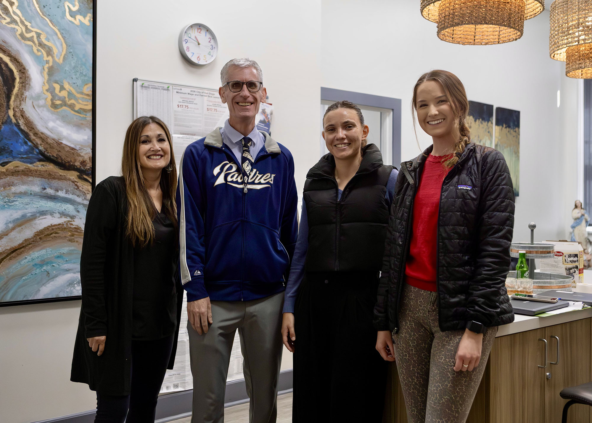 Smiling teachers and staff of Our Lady's School.